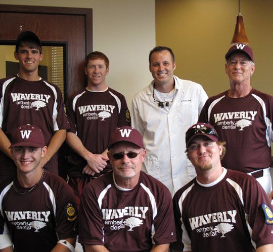 Doctor Vacek with baseball team 