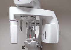 CBCT scanner in front of wall in dental office