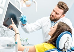 Dentist showing a patient their x rays