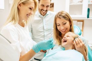 Mother and young girl at a dentist
