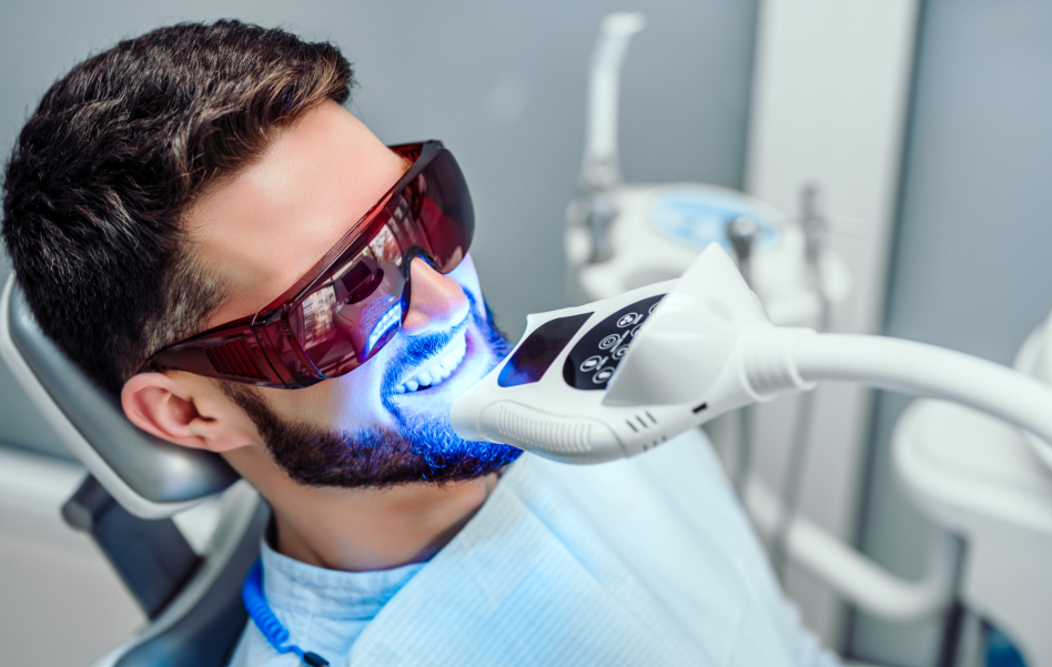 Patient receiving teeth whitening treatment