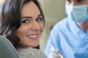 woman smiling at the dentist